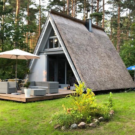 Ferienhaus Reetdach: Lakeside Retreat with Private Pier and Sauna Petersdorf  Exterior photo