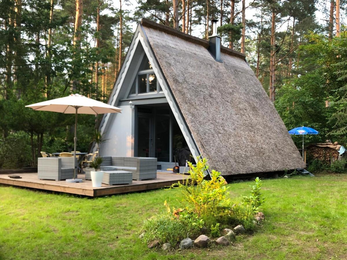 Ferienhaus Reetdach: Lakeside Retreat with Private Pier and Sauna Petersdorf  Exterior photo