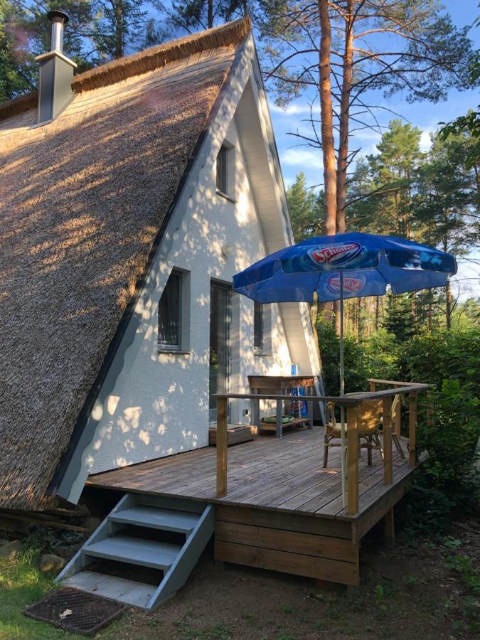 Ferienhaus Reetdach: Lakeside Retreat with Private Pier and Sauna Petersdorf  Exterior photo